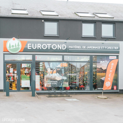 Vue extérieure du magasin Eurotond à Wanze, spécialiste en matériel de jardinage et foresterie.